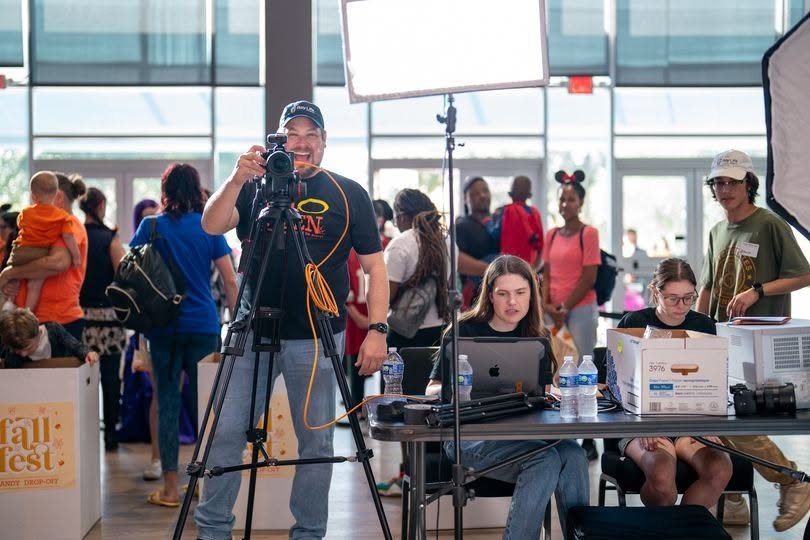 Stephen Stough directing a video crew on set at a Bay Life Church event